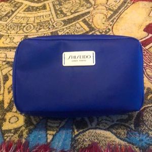Shiseido toiletries bag plus samples